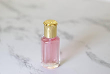 Load image into Gallery viewer, Women&#39;s fragrant body oil in bougie pink. - Bili&#39;s Bougie Boutique
